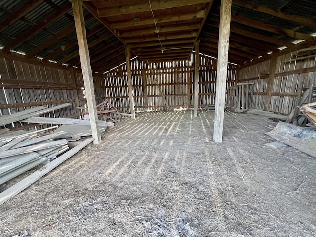 miscellaneous room featuring lofted ceiling