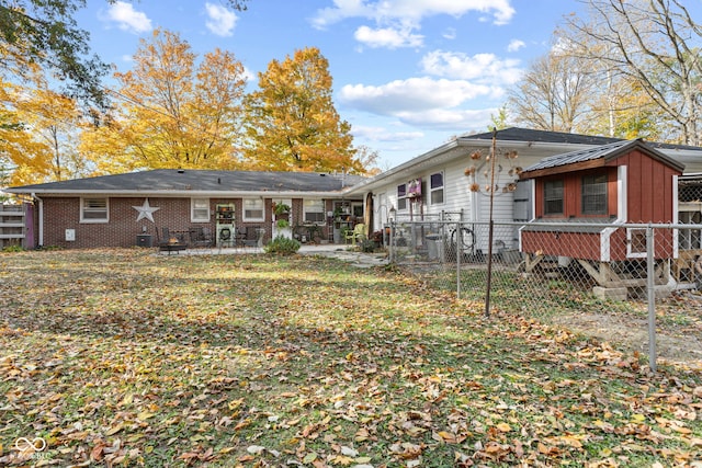 back of house featuring a patio area