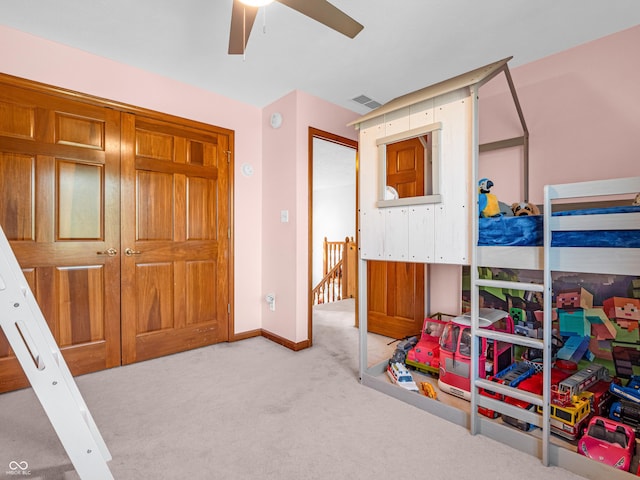 carpeted bedroom featuring ceiling fan