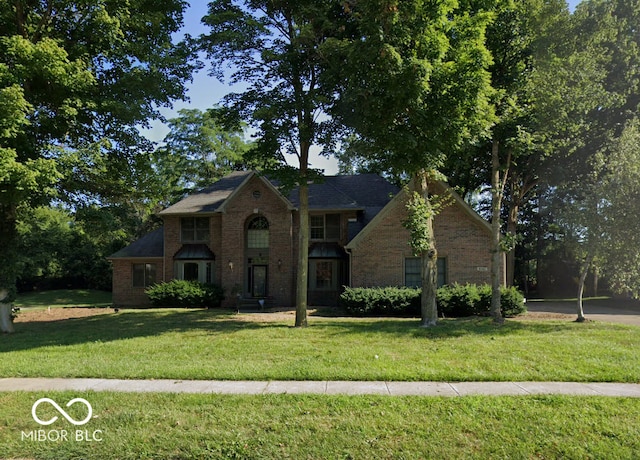 view of front of home with a front yard