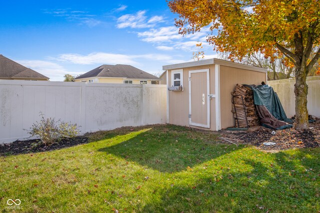 view of outbuilding featuring a yard