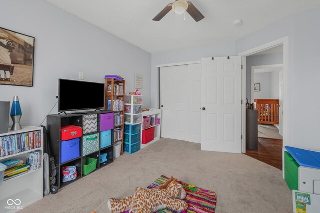 game room featuring carpet floors and ceiling fan