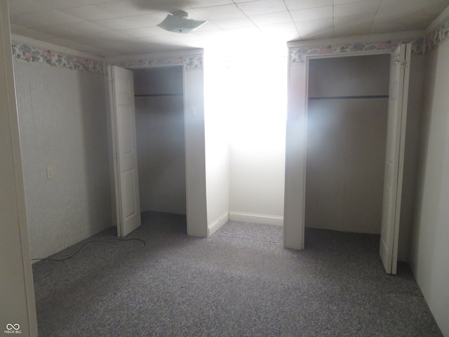 unfurnished bedroom featuring light colored carpet