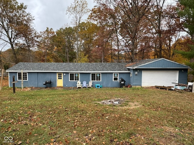 back of house featuring a lawn