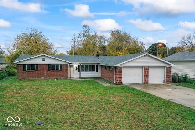 ranch-style house with a garage and a front lawn