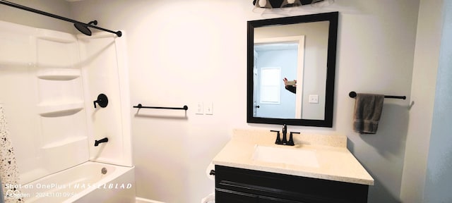 12544 S State Road 3, Westport, IN 47283 - full bathroom with vanity, tub / shower combination, and baseboards