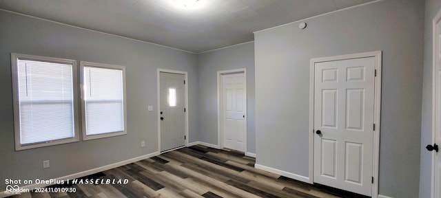 12544 S State Road 3, Westport, IN 47283 - entryway with dark wood finished floors and baseboards