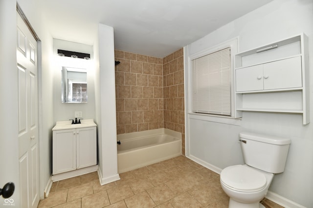 full bathroom featuring vanity, toilet, and tiled shower / bath