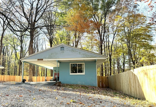 view of front of home featuring a carport