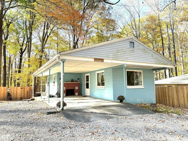 view of front of home with a carport