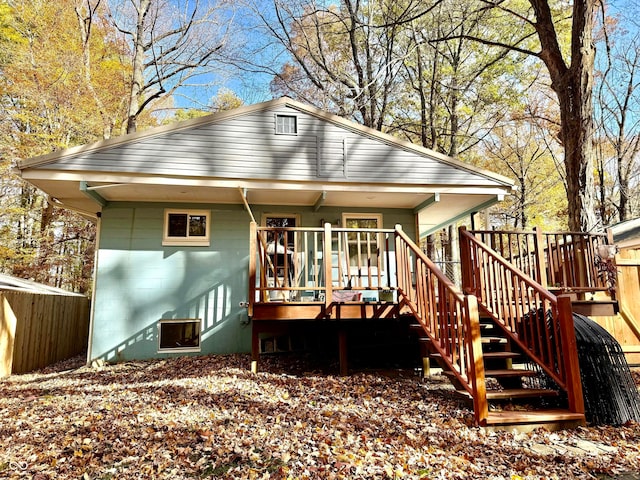 rear view of house with a deck