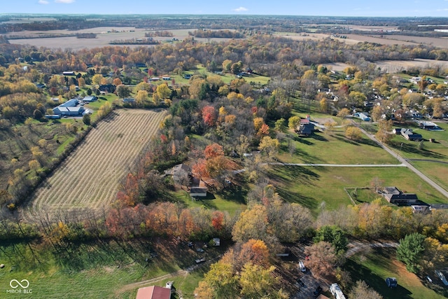 birds eye view of property featuring a rural view