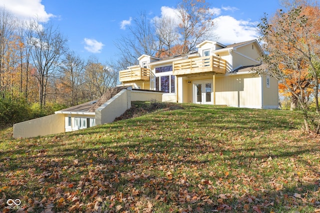 view of home's exterior with a lawn