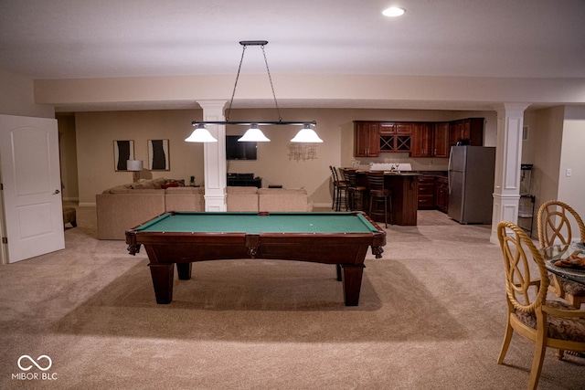 rec room featuring pool table, light carpet, and indoor bar