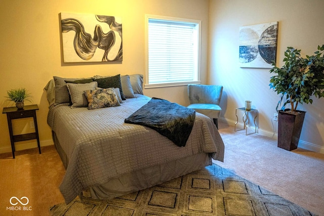 bedroom with light carpet