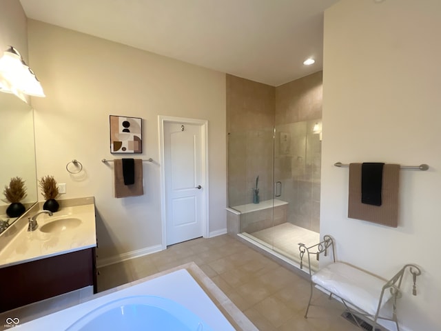 bathroom with vanity and a shower with shower door