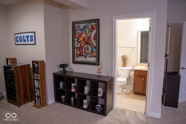 interior space with toilet and vanity