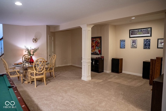 carpeted dining area featuring billiards and decorative columns