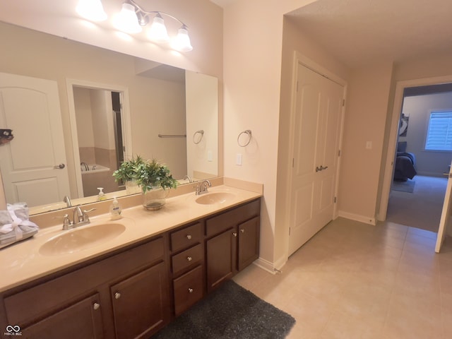 bathroom with vanity and tile patterned floors