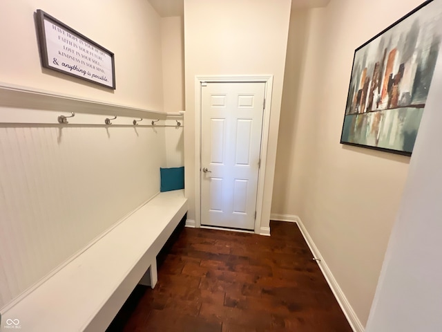 mudroom with dark hardwood / wood-style flooring