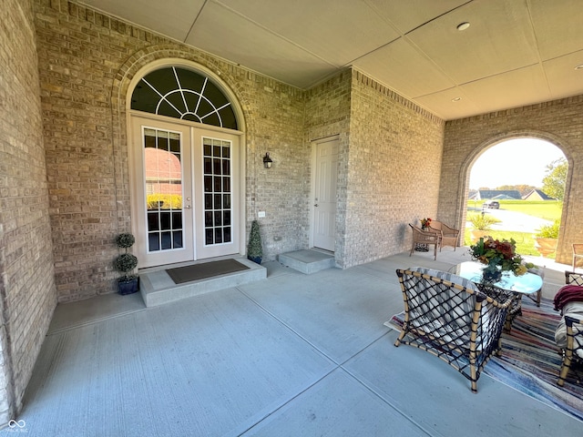 property entrance featuring french doors