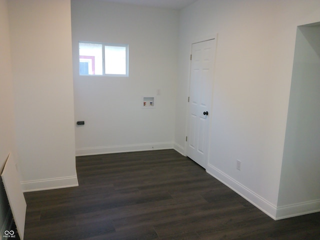 washroom featuring washer hookup and dark wood-type flooring