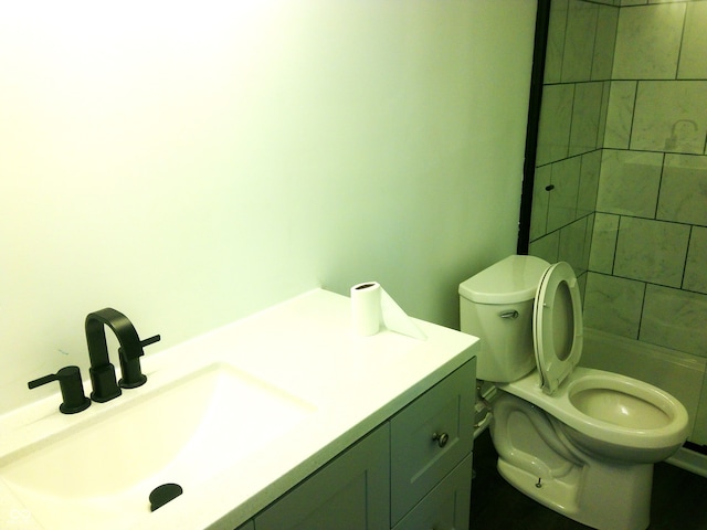 bathroom with vanity and toilet