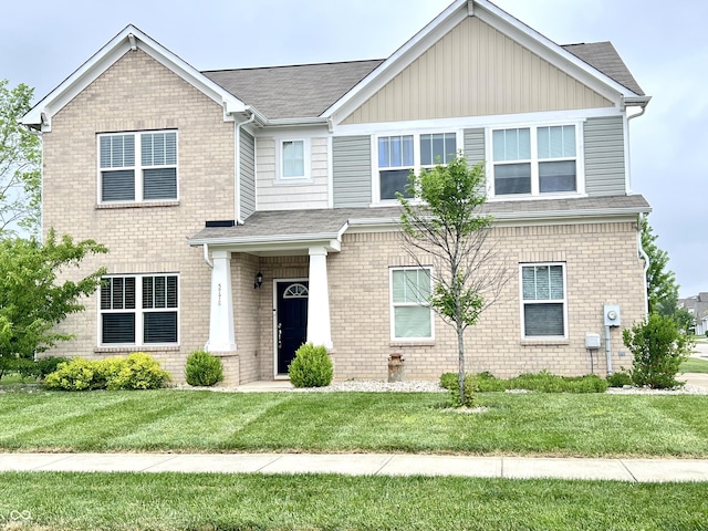 5778 W Commonview Dr, Mccordsville, IN 46055 - craftsman inspired home featuring a front yard and brick siding