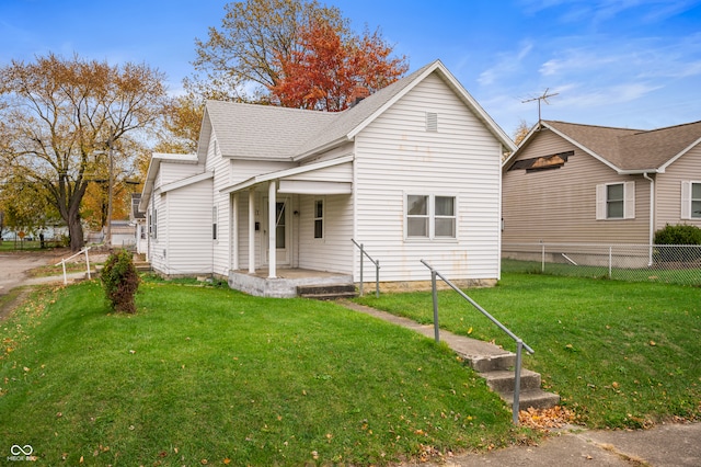 view of front of home with a front yard