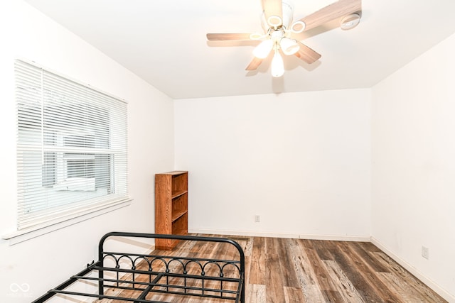 bedroom featuring dark hardwood / wood-style floors