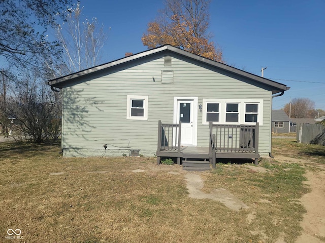 325 E Church St, Paragon, IN 46166 - rear view of house with a deck and a lawn