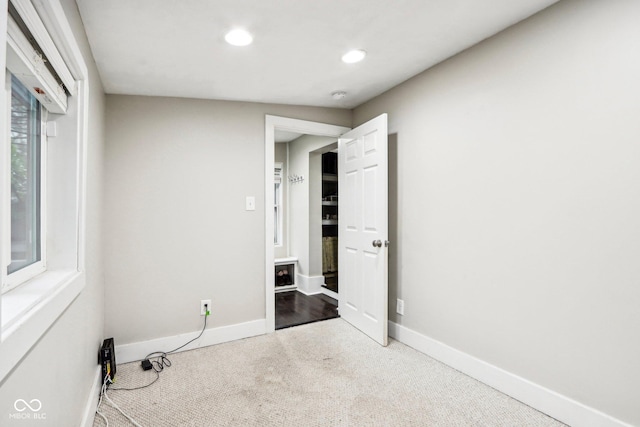 2028 Hoyt Ave, Indianapolis, IN 46203 - unfurnished bedroom with baseboards, recessed lighting, and carpet flooring