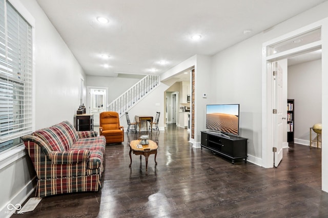 2028 Hoyt Ave, Indianapolis, IN 46203 - living area featuring stairway, wood finished floors, baseboards, and recessed lighting