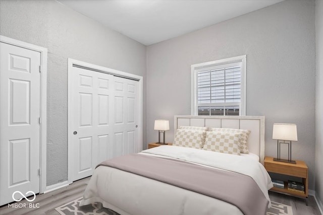 bedroom featuring light wood-type flooring