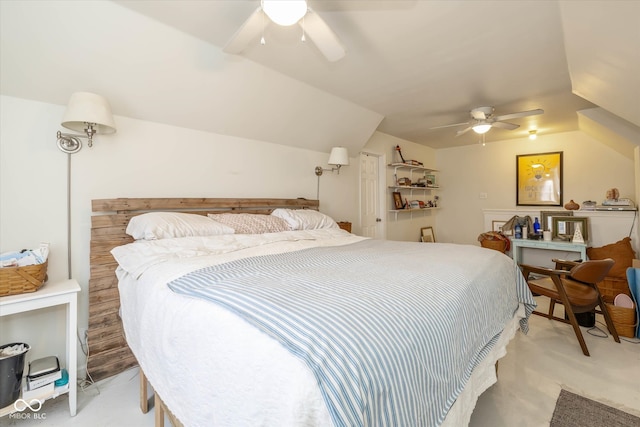 carpeted bedroom featuring ceiling fan and vaulted ceiling