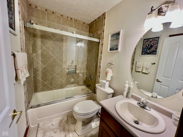 full bathroom featuring vanity, bath / shower combo with glass door, a textured ceiling, and toilet