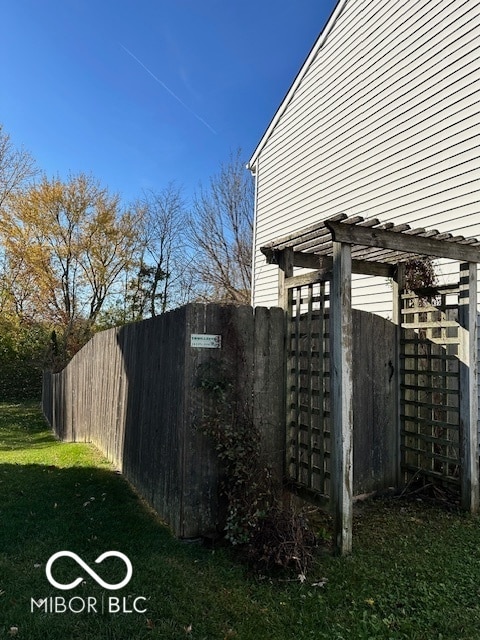 view of home's exterior with a yard