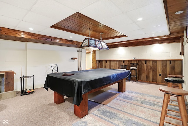 game room with light colored carpet, bar, billiards, and a drop ceiling