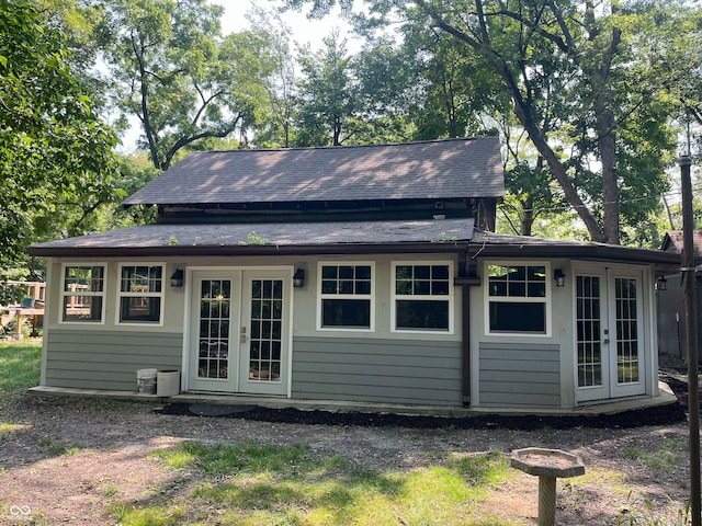 back of house featuring french doors