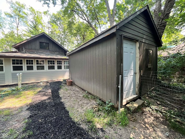 exterior space featuring a shed