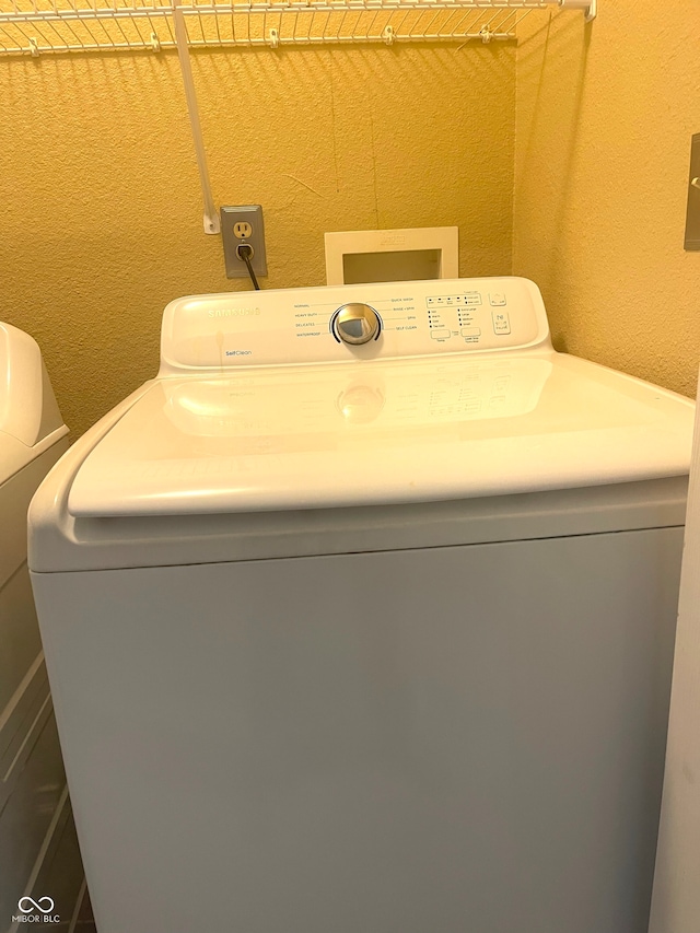 washroom featuring washer / clothes dryer