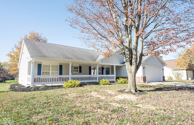 single story home featuring a garage, a front yard, and a porch