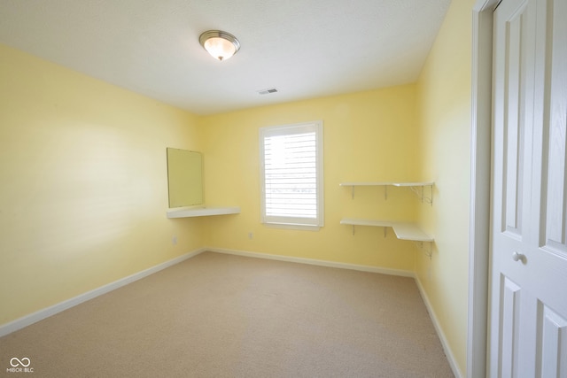 empty room with carpet floors