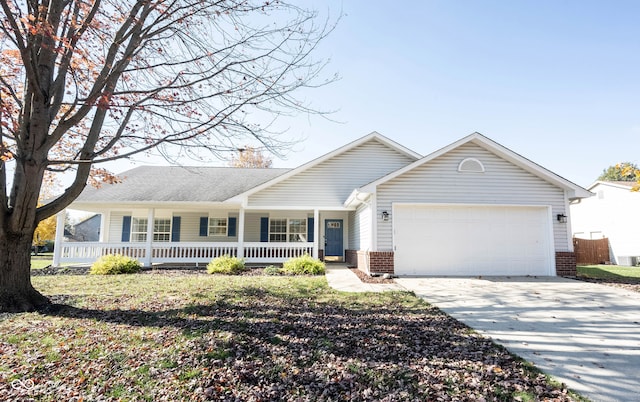 ranch-style home with a garage and a porch