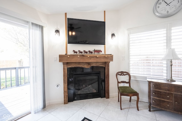 living room featuring light tile patterned floors and plenty of natural light