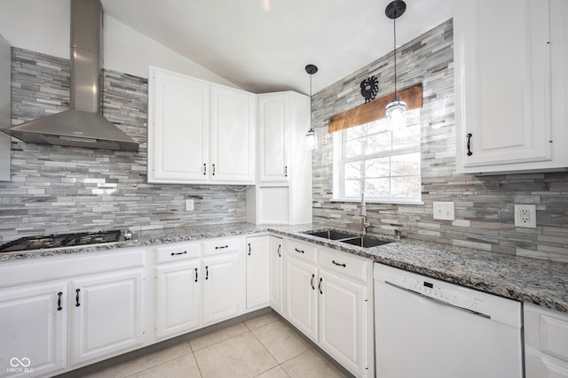 kitchen with white cabinetry, decorative light fixtures, stainless steel gas stovetop, dishwasher, and wall chimney exhaust hood