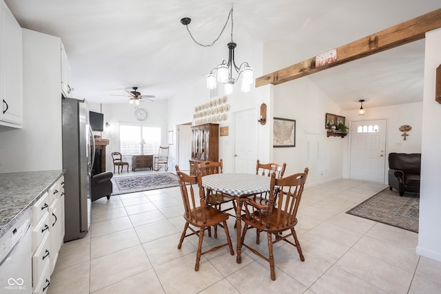 tiled dining space with ceiling fan with notable chandelier and vaulted ceiling with beams