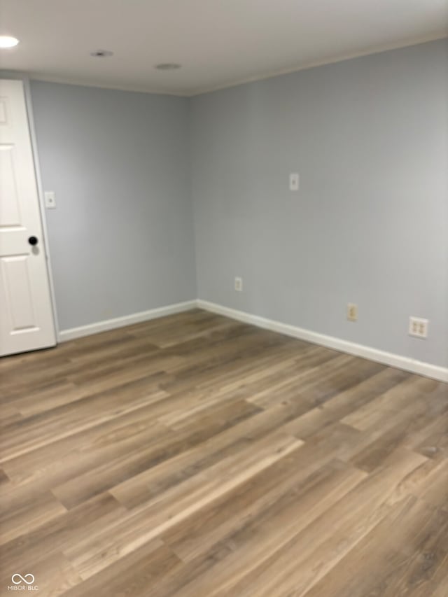 unfurnished room featuring hardwood / wood-style floors