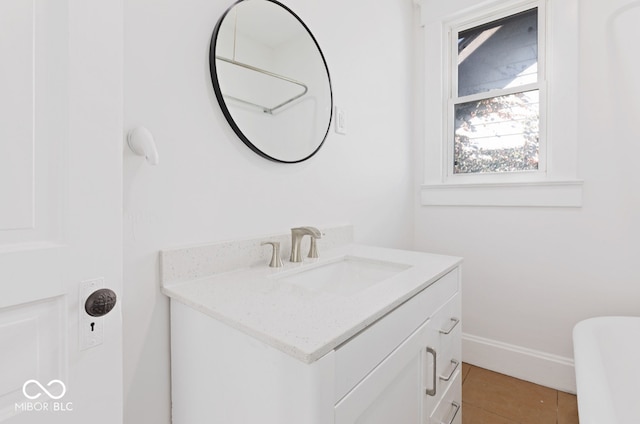 bathroom featuring vanity and tile patterned flooring