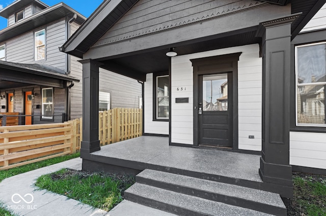 doorway to property featuring a porch